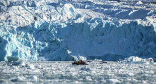 Zodiac cruising near glacier front - Hurtigruten Expeditions - Jan Hvizdal